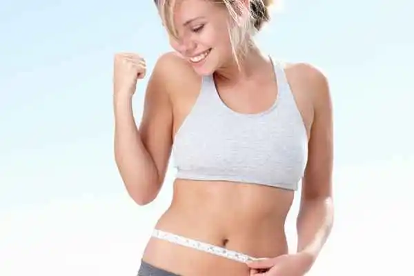 woman happy after fat reduction treatment Lincolnshire