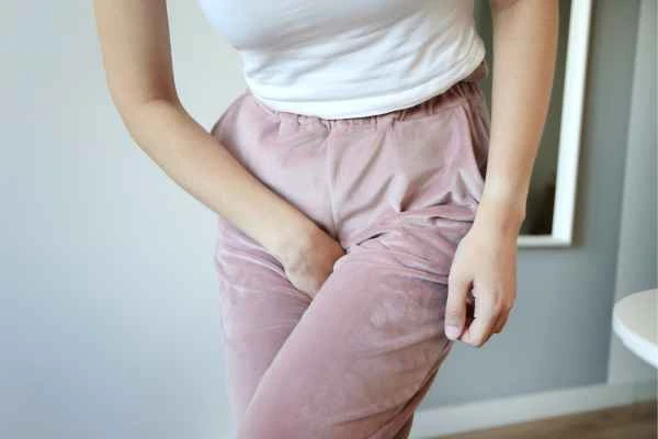 older woman running to the toilet because of urinary incontinence Lincolnshire
